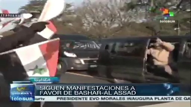 Siguen manifestaciones en apoyo a Al Assad en Ginebra