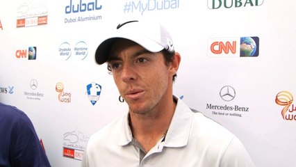 McIlroy satisfied to hold onto lead