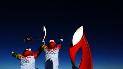 Olympic flame reaches Mount Elbrus, Europe's highest peak