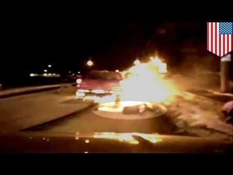 Police dash cam video: Woman thrown from burning car in high-speed chase
