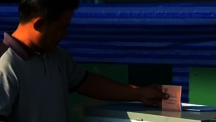 Peaceful voting in Thailand unlikely to stop unrest