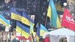 Protesters in Kyiv show no sign of moving as Yanukovych returns to work