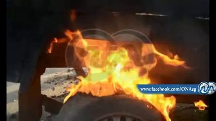 شاهد.. عربتان للشرطة أحرقها الإخوان أعلى الطريق الدائري