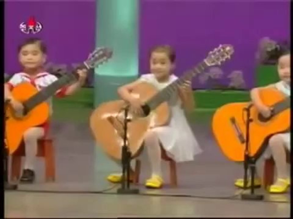 North Korea children playing the guitar Creepy as hell