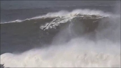 British Surfer Andrew Cotton 'Rides World's Biggest Wave' in Nazaré, Portugal