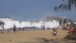 Beach with giant waves protected by a stone wall in Puerto Rico | www.itblow.com