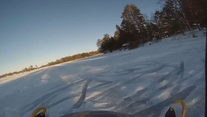 Snowmobile Hits A Bump And Crashes!
