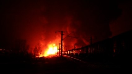 Fire spreads after train derails in Russia