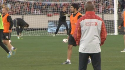 Arsene Wenger se reencuentra con Luis Suárez