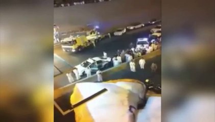 Video shows Saudi fireman KICKS suicidal 'jumper' off high ledge on to airbag below