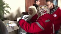 Civilians evacuated from Syria's besieged Homs