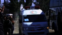 Busloads of Syrians evacuate Homs