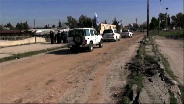 Syrie : les premiers civils évacués de Homs, après un long siège