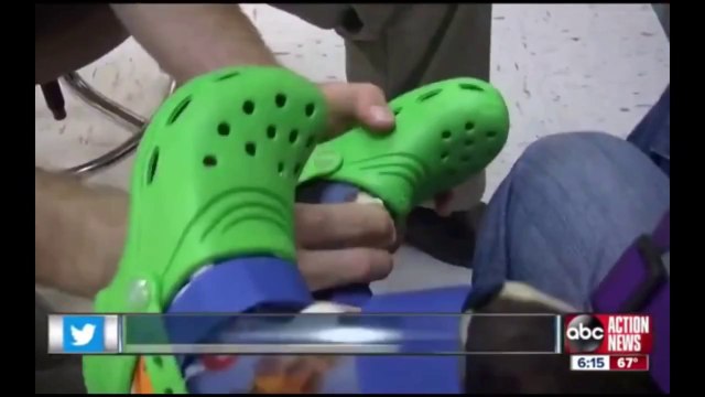 Spencer The Dog_ Paralyzed Dog Walking with Crocs and Braces