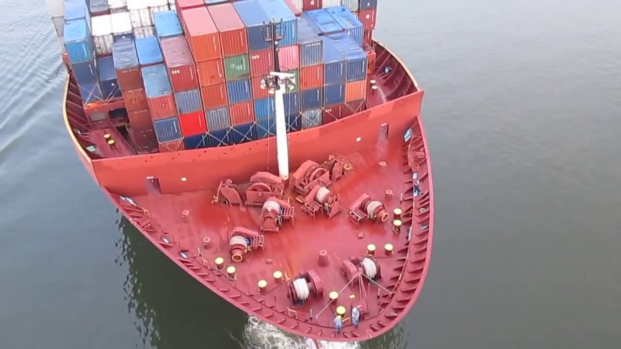 Giant Shipping Boat Passing Under Bridge Is Mesmerizing