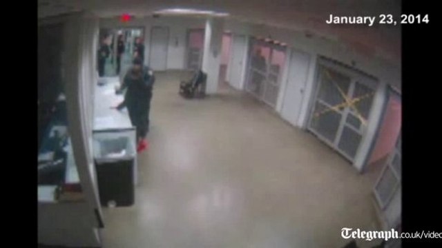 Police release footage of Justin Bieber being processed in jail - prison CCTV