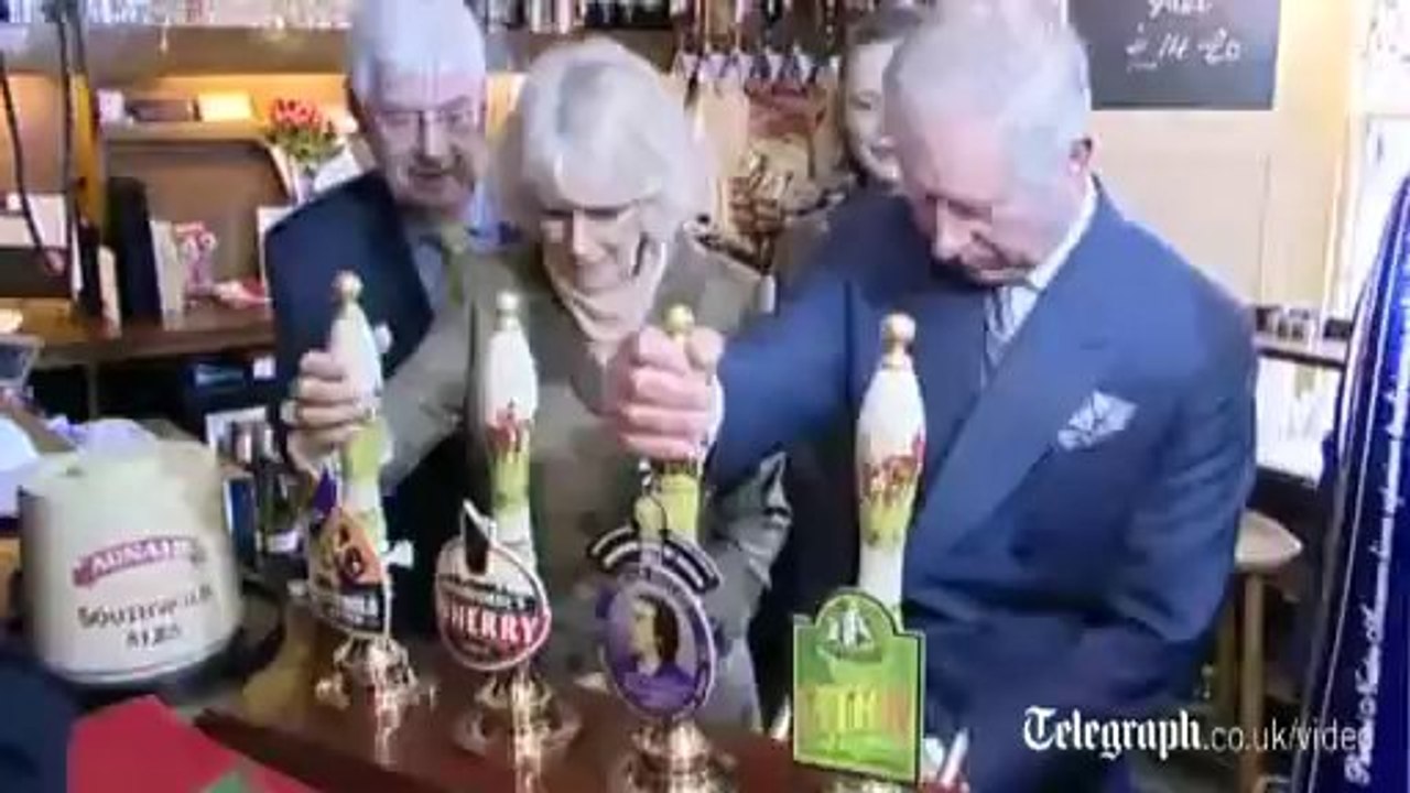 Prince Charles and Camilla pull pints
