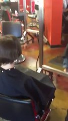 thick brown hair cut off into 4 ponytails