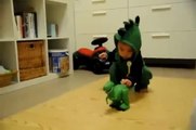So cute baby scared by dinosaur toy... Hilarious!