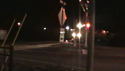 BNSF power leads NS 735 SB through Austell Ga.