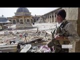 Syrian government barrel bombs kill scores in Aleppo
