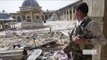 Syrian government barrel bombs kill scores in Aleppo