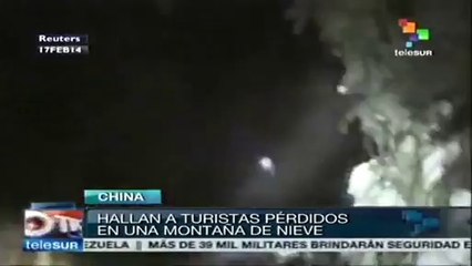 Rescatan a turistas aislados por la nieve en China