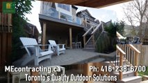 PVC deck with glass railings and walkout basement