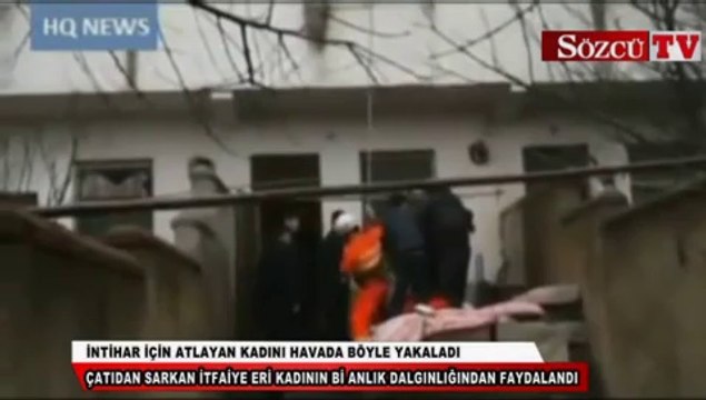 İntihar için atlayan kadını havada böyle yakaladı
