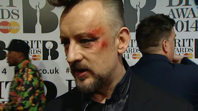 Boy George sports bloody eye make-up on Brits red carpet