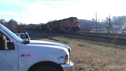 BNSF power leads NS 734 NB through Austell Ga.