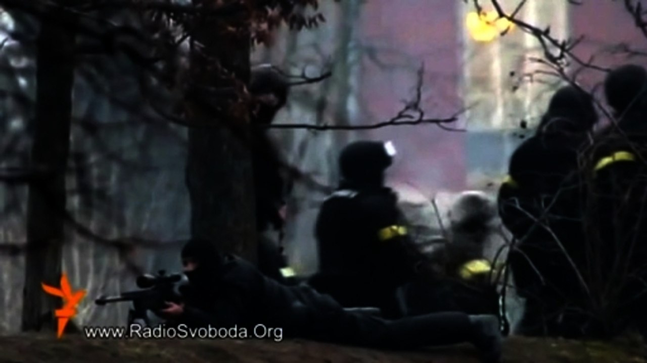 Riot police and a sniper filmed opening fire at protesters in Kiev