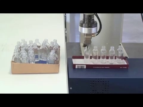 Adept Robotics - Adept Cobra SCARA Handling Small Glass Bottles