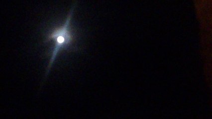 White Light in the sky UFO or Moon?