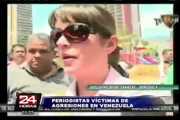 下载视频: Periodistas sufren agresiones por parte de las autoridades venezolanas