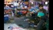 Bangkok blast kills woman and child, injures at least 24