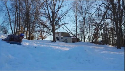 New Yorker Performs Sled Tricks in the Snow