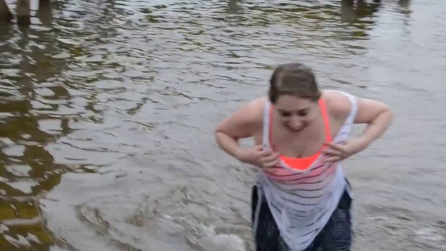 Girl Takes Plunge Into Freezing Lake
