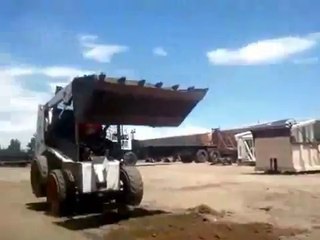 Régis sur une pelleteuse