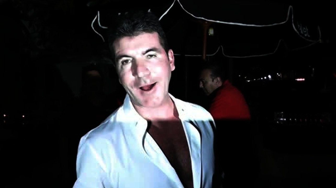 Simon Cowell Talks About Bringing Baby to Beach