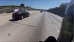 Motorcycle chases wreckless highway patrol police car then cop realizes he is being filmed