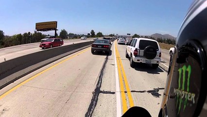 Splitting lanes through heavy traffic on the freeway
