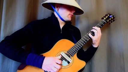 Reprise du thème du jeu vidéo Mortal Kombat à la guitare : Enorme!