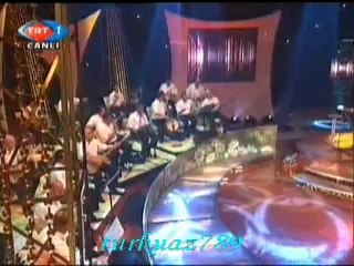 Gülşen KUTLU-Yüksek Ayvanlarda Bülbüller Öter