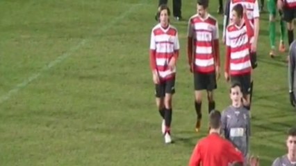 One Direction’s Louis Tomlinson puts on his football shorts