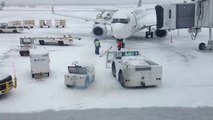 Westjet 737 drifting away from the bridge due to strong winds