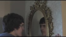 Ghost face in mirror, oculus haunted mirror