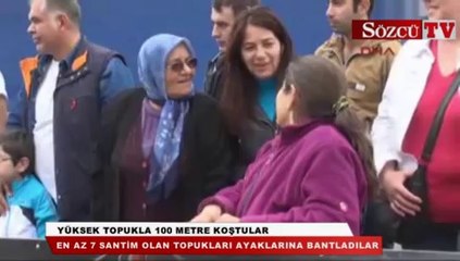 Yüksek topukla 100 metre koştular