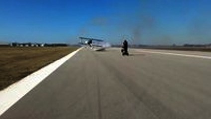 Plane passes within feet of a person