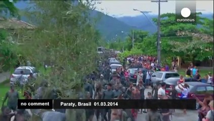 Brazilians enjoy black mud carnival